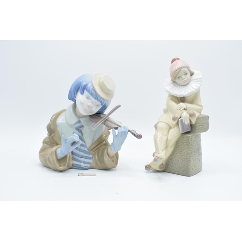 58 - Lladro figures to include Little Jester 5203 and The Blues Clown 5600 (a/f) (2). The violin bow has ... 