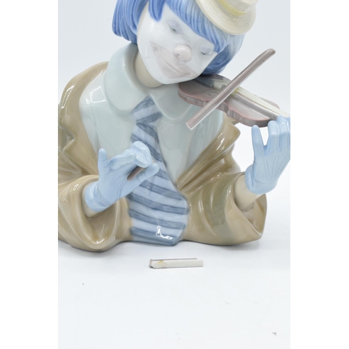 58 - Lladro figures to include Little Jester 5203 and The Blues Clown 5600 (a/f) (2). The violin bow has ... 