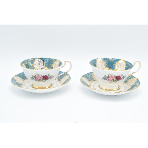 65 - A pair of Paragon blue cups and saucers together with a Brian Leaman (Ex Royal Worcester) fruit scen... 