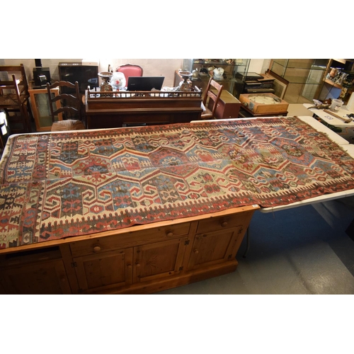 95 - 20th century carpet, believed to be a Persian Hendesi design Heriz. Approximately 140 x 337cm.  Ther... 