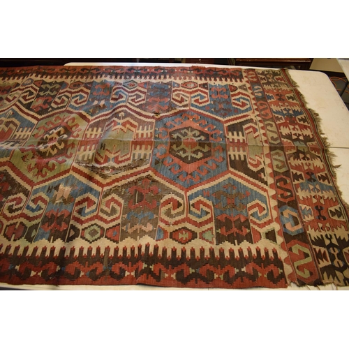 95 - 20th century carpet, believed to be a Persian Hendesi design Heriz. Approximately 140 x 337cm.  Ther... 