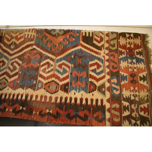 95 - 20th century carpet, believed to be a Persian Hendesi design Heriz. Approximately 140 x 337cm.  Ther... 