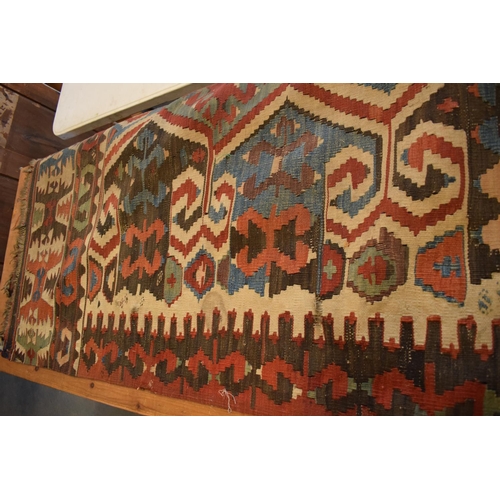 95 - 20th century carpet, believed to be a Persian Hendesi design Heriz. Approximately 140 x 337cm.  Ther... 