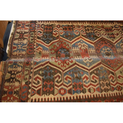 95 - 20th century carpet, believed to be a Persian Hendesi design Heriz. Approximately 140 x 337cm.  Ther... 