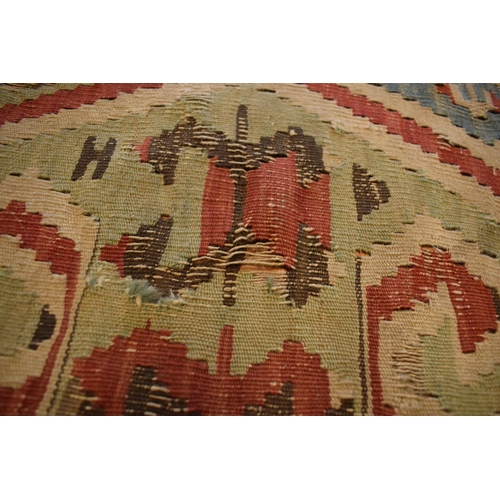 95 - 20th century carpet, believed to be a Persian Hendesi design Heriz. Approximately 140 x 337cm.  Ther... 