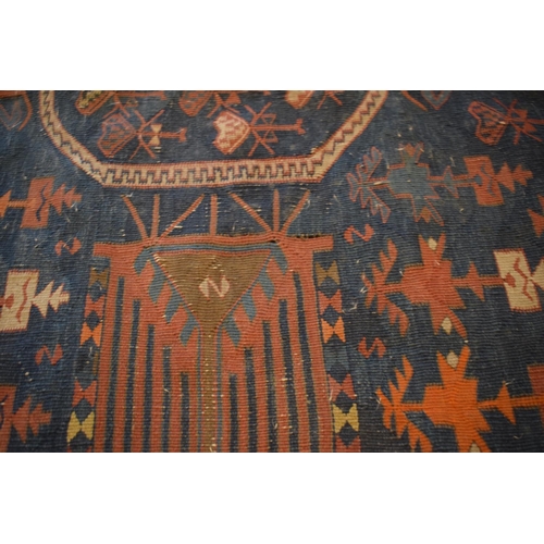 96 - Large 20th century wall hanging believed to be a  Persian Qashqai carpet with four blue ground lozen... 