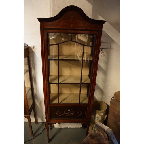 344 - Edwardian inlaid mahogany and glass display cabinet. There is a crack to one leg. worm is apparent, ... 