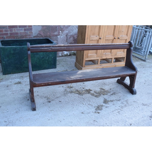 354 - 19th century wooden church pew with back rest. In good structural condition with signs of wear and u... 