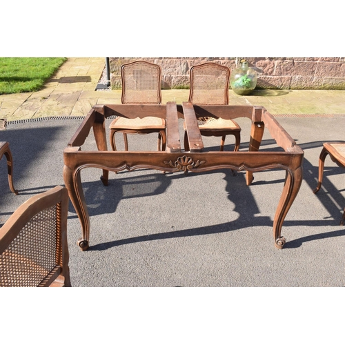 358 - Edwardian extending table together with 6 wicker-style back dining chairs (7). The table is in good ... 