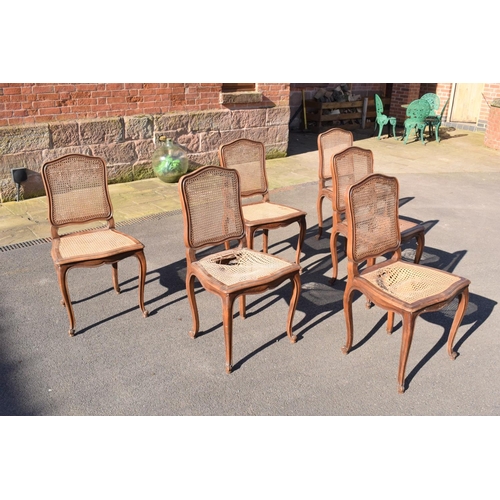 358 - Edwardian extending table together with 6 wicker-style back dining chairs (7). The table is in good ... 