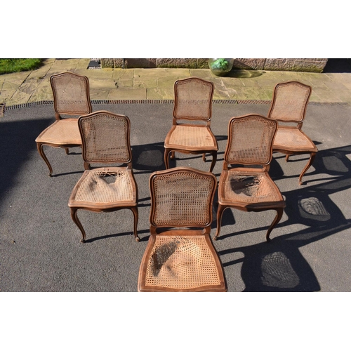 358 - Edwardian extending table together with 6 wicker-style back dining chairs (7). The table is in good ... 