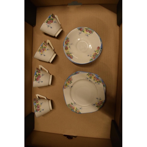 276 - Diamond China Art Deco floral part tea set to include 6 trios (missing 2 cups) (16 pieces)