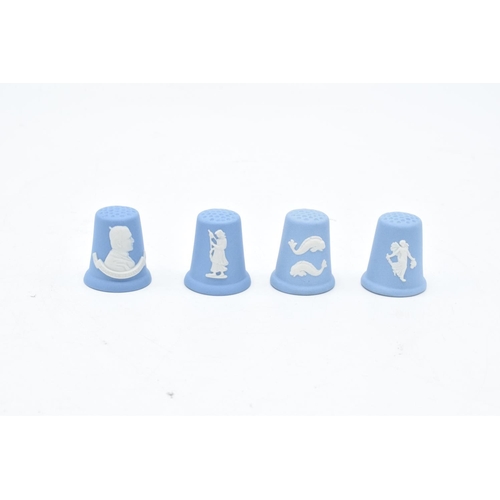 14 - Wedgwood Jasperware thimbles to include a fish, Joannes Pavlvs II, a lady and dancing hours design (... 