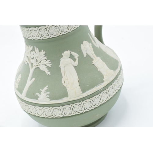 15 - Wedgwood Jasperware sage green footed bowl together with a water jug and a black vase (3). In good c... 