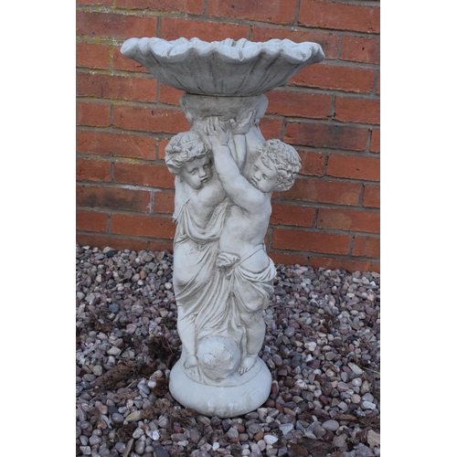 251 - Reconstituted stone birdbath depicting children. 65cm tall. 

Made in England, these items are frost... 