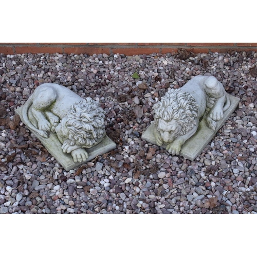 254 - Reconstituted stone models of sleeping lions . 

Made in England, these items are frost and weather ... 