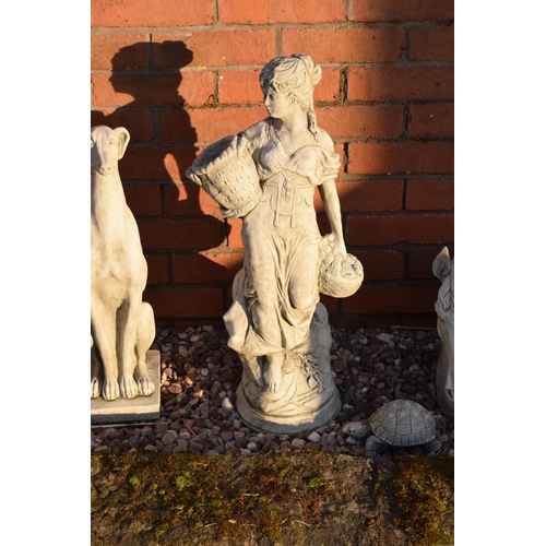 257 - Reconstituted stone model of a girl holding a basket. 66cm tall. 

Made in England, these items are ... 