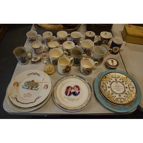 282 - A collection of Coronation mugs, plates and odds dating from Queen Victoria to the present day inclu... 