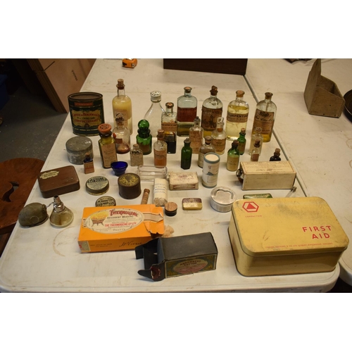 286 - A quantity of interesting early 20th century medicine and pesticide bottles, tins and jars etc (Some... 