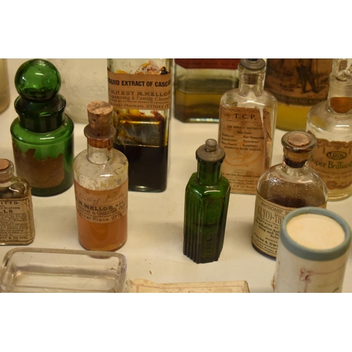 286 - A quantity of interesting early 20th century medicine and pesticide bottles, tins and jars etc (Some... 