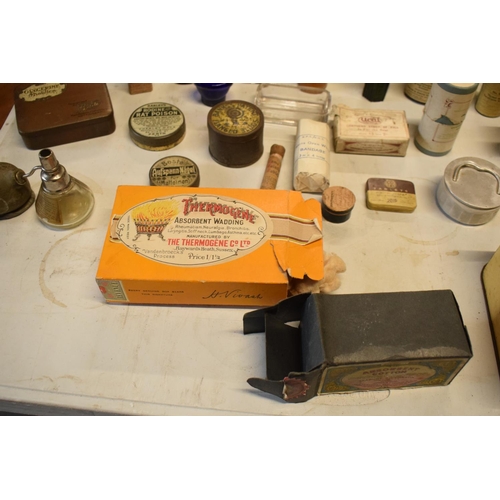 286 - A quantity of interesting early 20th century medicine and pesticide bottles, tins and jars etc (Some... 