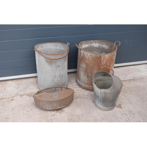 289 - A collection of early 20th century tin bins, anti spill milking bucket and a mesh sorting bucket by ... 