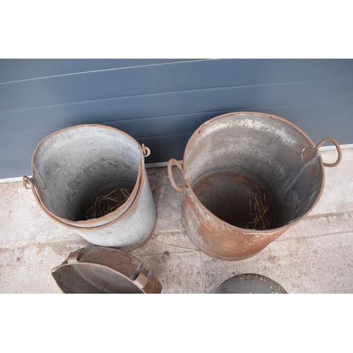 289 - A collection of early 20th century tin bins, anti spill milking bucket and a mesh sorting bucket by ... 