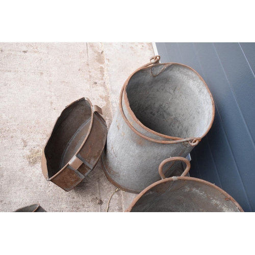 289 - A collection of early 20th century tin bins, anti spill milking bucket and a mesh sorting bucket by ... 