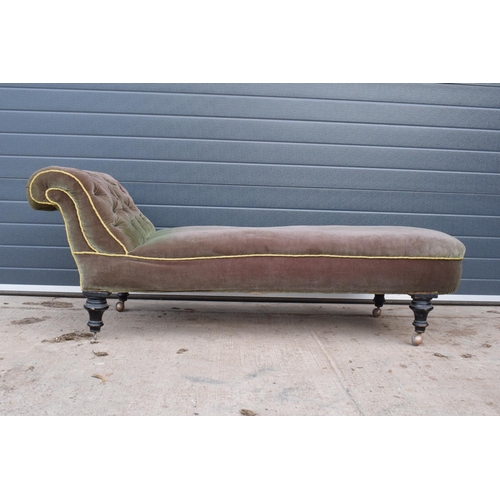 295 - Late Victorian upholstered chaise long filled with horse hairs on casters (one missing). Small rip t... 