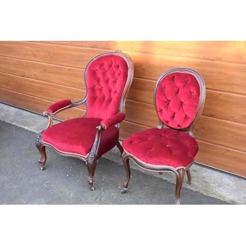 296 - A pair of Edwardian upholstered His and Hers chairs on casters. Signs of old worm. There have been s... 