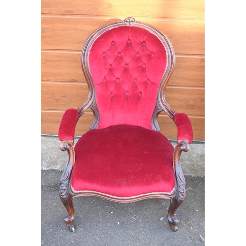 296 - A pair of Edwardian upholstered His and Hers chairs on casters. Signs of old worm. There have been s... 