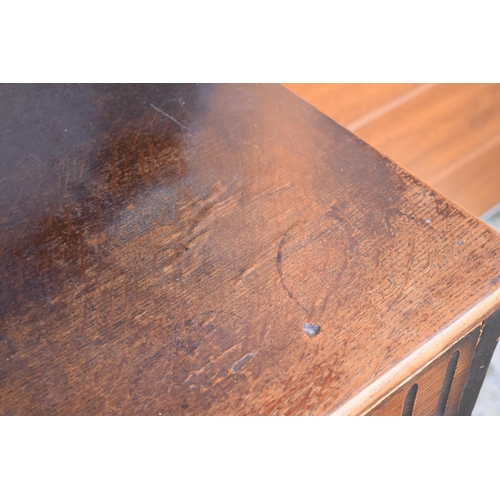 297 - 1930s oak dresser and rack. No back to it. Doors don't stay shut. 124 x 47 x 178cm.