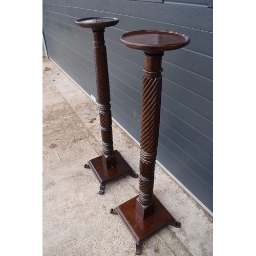 298 - Pair of Victorian mahogany plant stands/ torcheres. One had been converted to a lamp base and still ... 