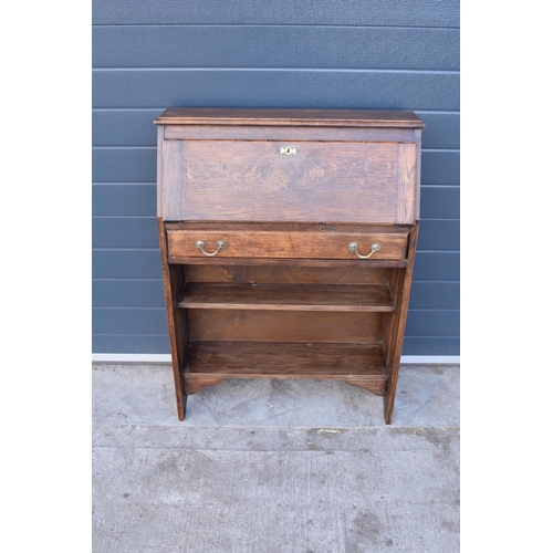 299 - Edwardian oak students desk/ bureau with brass handles. 104 x 75 x 25cm.