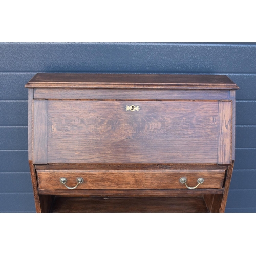 299 - Edwardian oak students desk/ bureau with brass handles. 104 x 75 x 25cm.