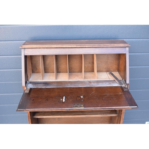 299 - Edwardian oak students desk/ bureau with brass handles. 104 x 75 x 25cm.