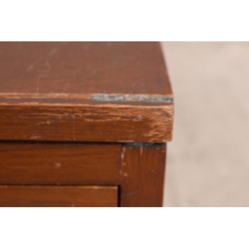 303 - Plan low lying chest of drawers raised on ball feet. 116 x 88 x 34cm. Feet screw into the base. Scra... 