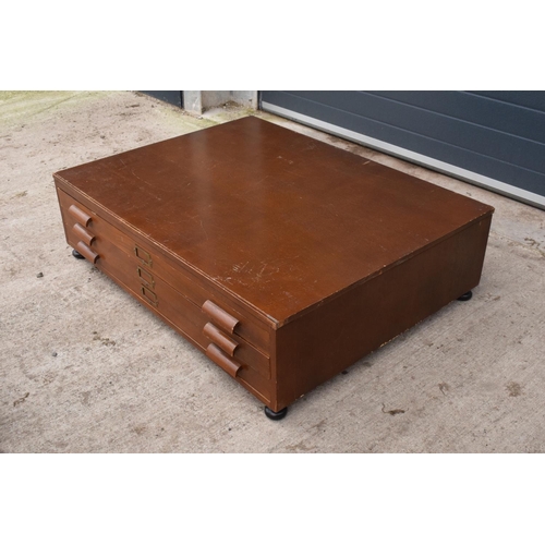 303 - Plan low lying chest of drawers raised on ball feet. 116 x 88 x 34cm. Feet screw into the base. Scra... 