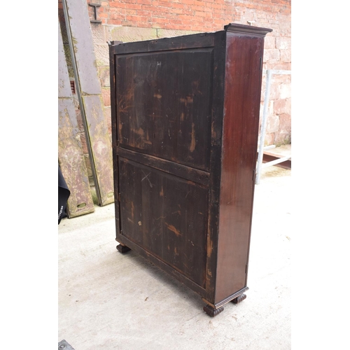 306 - Large Victorian mahogany bookcase on carved feet with foldout sides and a glass panelled door. 3 adj... 