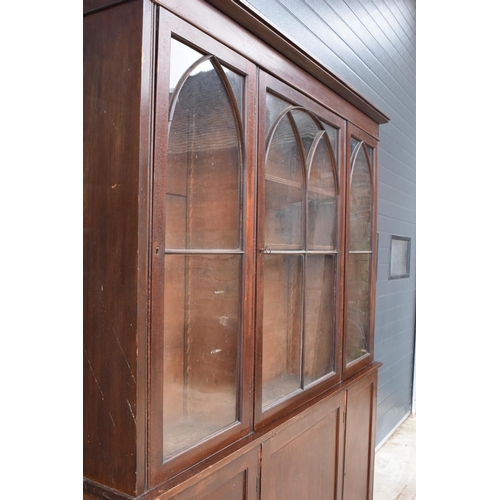 307 - large Victorian estate-made bookcase with adjustable shelves and arched doors. A great item which is... 