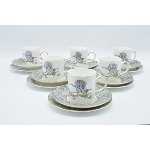 51 - A collection of Wedgwood china trios in the Humming Birds design (18 pieces). In good condition with... 