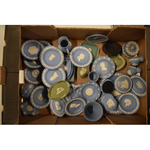 54 - A collection of Wedgwood Jasperware to include jugs, pin trays, plates, trinkets, cruets etc (Approx... 