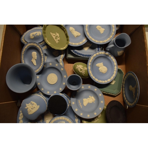 54 - A collection of Wedgwood Jasperware to include jugs, pin trays, plates, trinkets, cruets etc (Approx... 