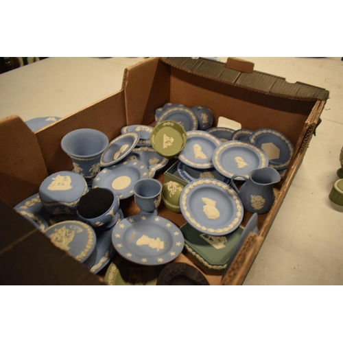 54 - A collection of Wedgwood Jasperware to include jugs, pin trays, plates, trinkets, cruets etc (Approx... 