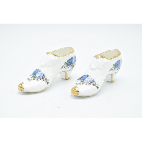 55 - A pair of Royal Albert shoes in the Moonlight Rose design (2). In good condition.