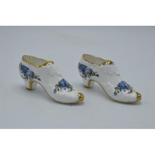 55 - A pair of Royal Albert shoes in the Moonlight Rose design (2). In good condition.