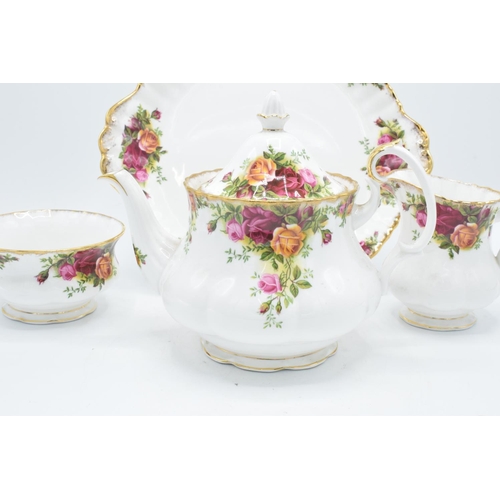 56 - A collection of Royal Albert Old Country Roses to include a medium tea pot, milk and sugar, cake pla... 