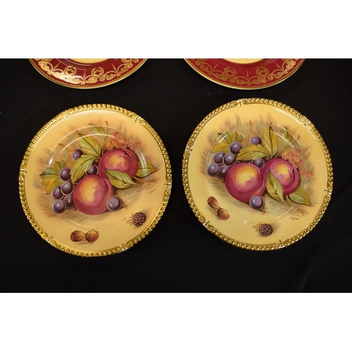 59 - A collection of Aynsley Orchard Gold plates with D Jones signature. In good condition with no obviou... 