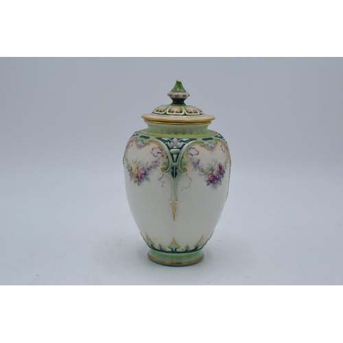 63 - Hadley's Worcester faience lidded vase with a guilded floral decoration. In good condition with no o... 