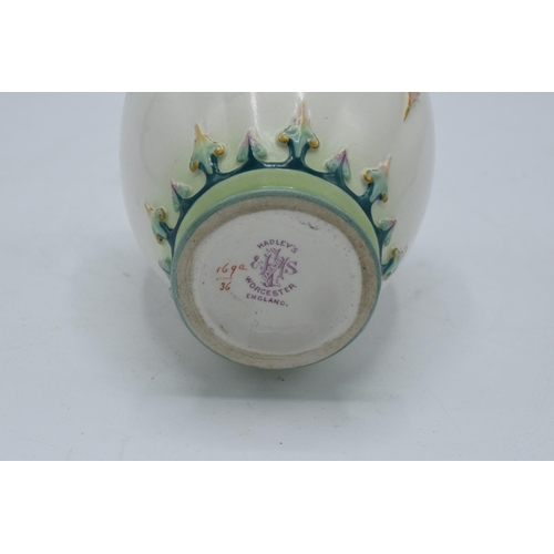 63 - Hadley's Worcester faience lidded vase with a guilded floral decoration. In good condition with no o... 